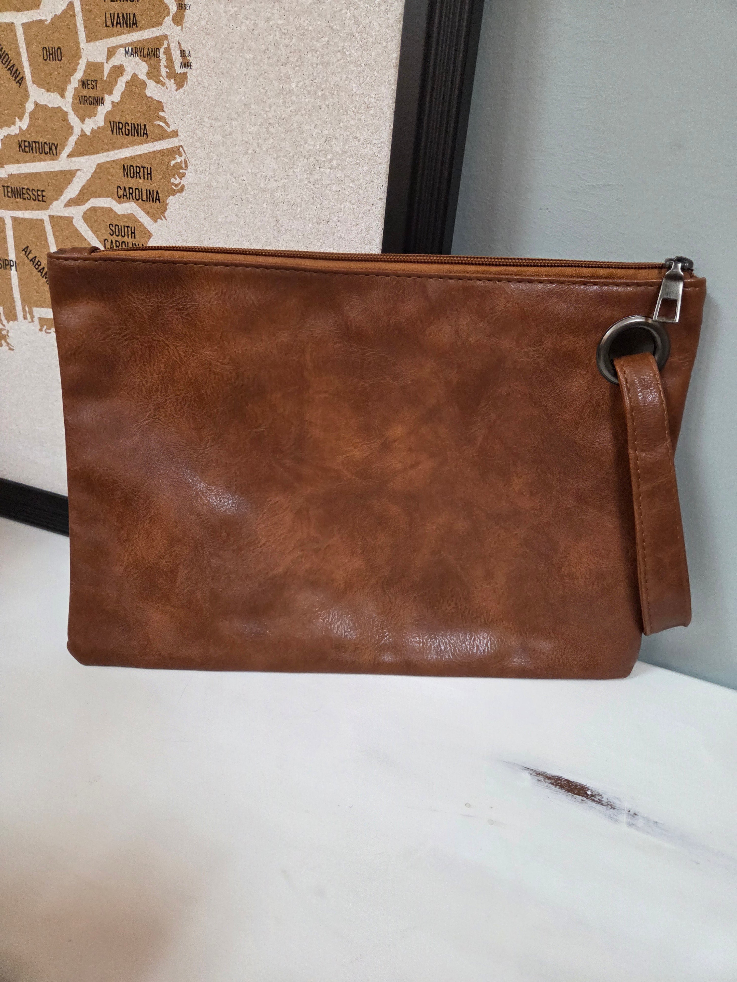 The Oversized Wristlet