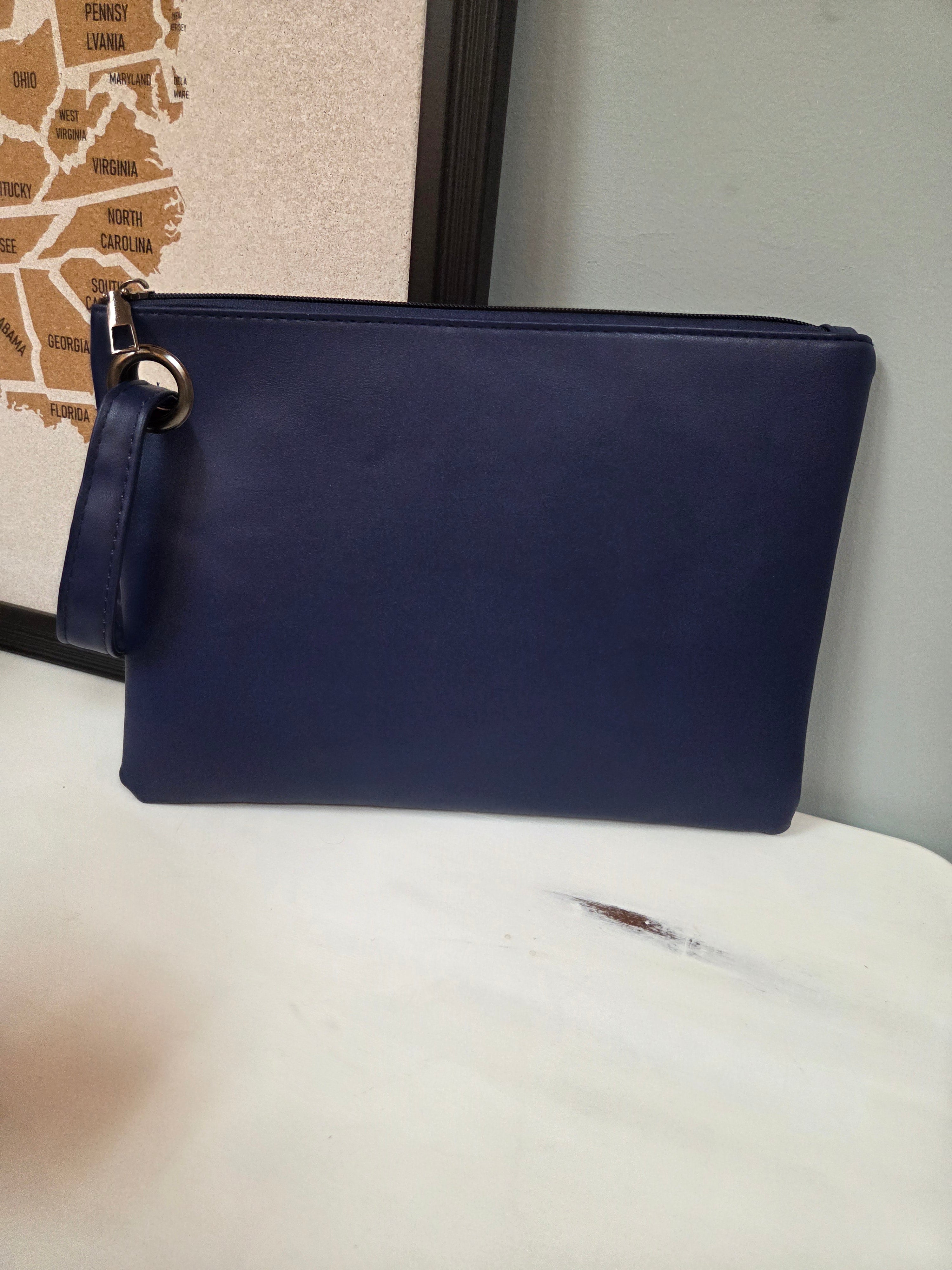 The Oversized Wristlet